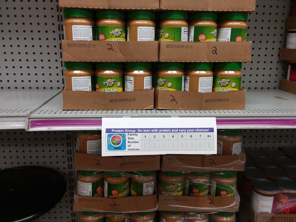 Choices of peanut butter on a shelf